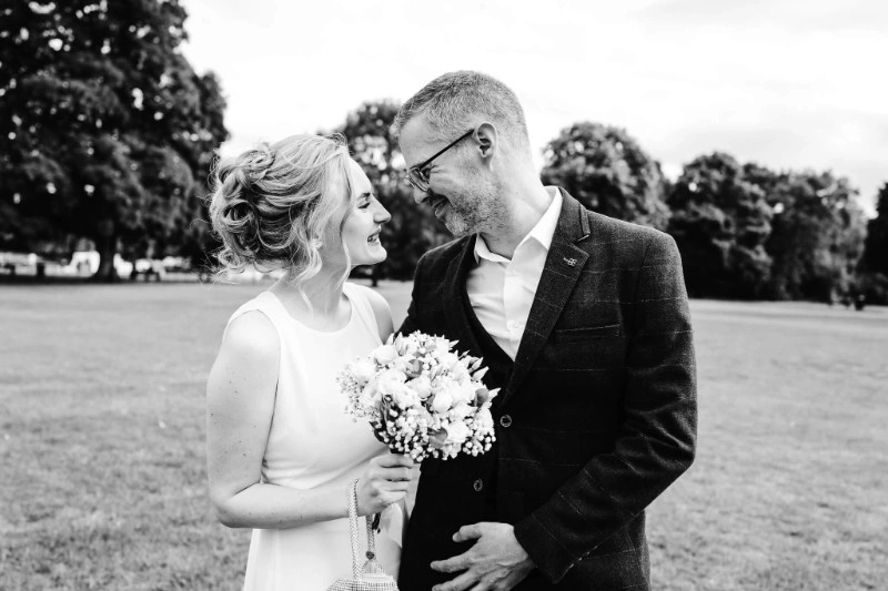 Bride and groom smiling at each other during a wedding portrait in Buckinghamshire